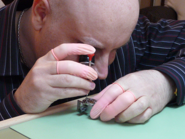 THE WATCHMAKER AT THE BENCH WATCHMAKING AND REPAIRING WATCHES, POCKET WATCHES, QUARTZ WATCHES
